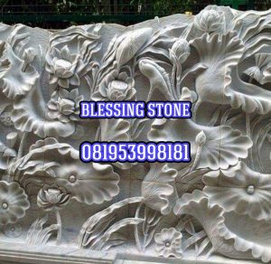Relief batu paras bunga